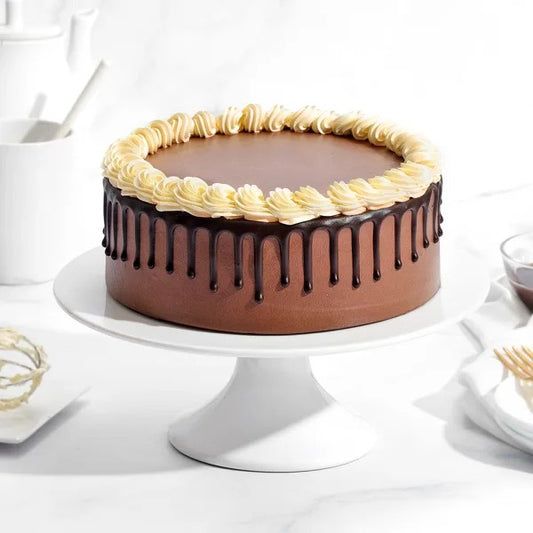 Buy or send Eggless Chocolate Drip Cake online with free delivery from Bakers Wagon