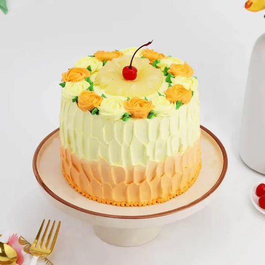 Buy or send Delectable Eggless Pineapple Cake online from Baker's Wagon