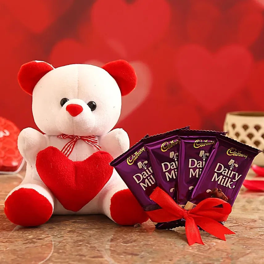 Buy or send Teddy With Dairy Milk Chocolates with online delivery from Bakers Wagon.
