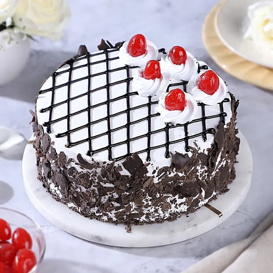 Buy or send Blissful eggless Black Forest Cake online to Jammu from Bakers Wagon