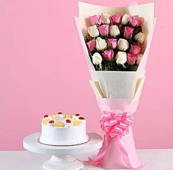 Buy/Sedn 20 Roses Bouquet and Pineapple Cake online with Baker's Wagon