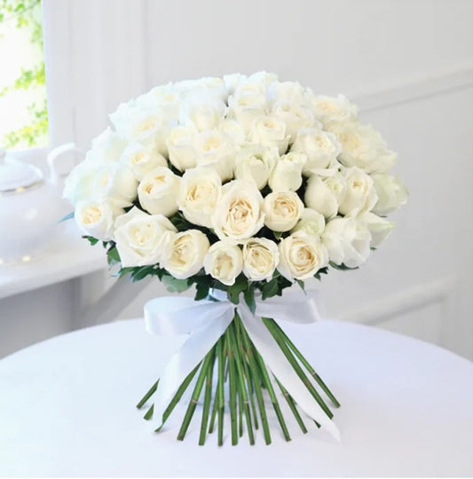 Buy/Send Peaceful 50 White Roses Bunch online with Baker's Wagon