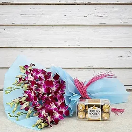 Buy/Send Orchids and Ferrero Rocher Combo with online delivery from Baker's Wagon