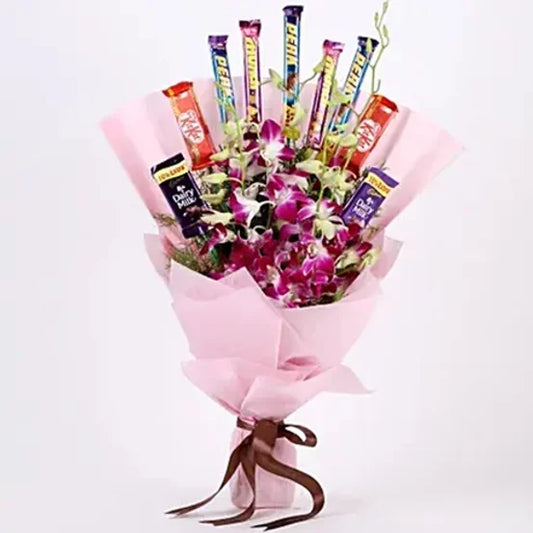 Online Purple Orchids & Chocolate Bouquet Delivery with Baker's Wagon