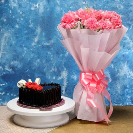 Online Pink Carnation and Heart Shape Chocolate Cake delivery with Baker's Wagon