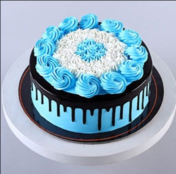 Online Blue Floral Black Forest Cake Delivery By Baker's Wagon