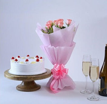 Buy/Send Pink Roses with Pineapple Cake combo with online delivery from Baker's Wagon