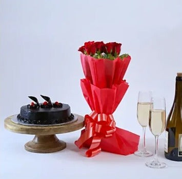 Buy/Send Proposal Combo of truffle cake and red roses with online delivery from Baker's Wagon