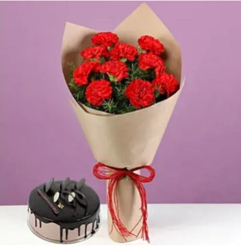 Buy/Send Red Carnations and Chocolate Cake combo with online delivery from Baker's Wagon.