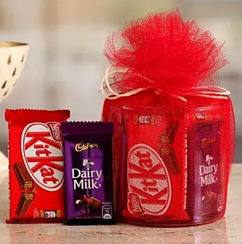 Buy/Send Rich Chocolate Gift Hamper of Kitkat and dairy milk chocolates with online delivery by Baker's Wagon
